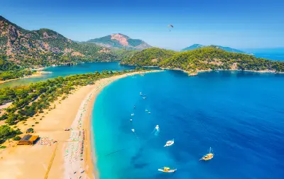 Aerial view of Ölüdeniz Beach, Blue Lagoon and turquoise Mediterranean water in southwestern Türkiye.