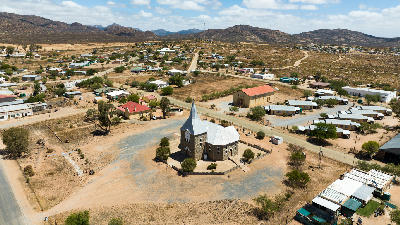 Aerial view of Kamieskroon town surrounded by granite mountains in the Kamiesberg region of Namaqualand, Northern Cape, South Africa.