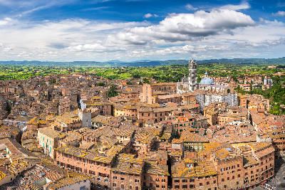 Aerial view over Siena, showing the medieval city layout in central Tuscany, Italy.
