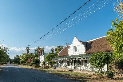 Cape Dutch house and quiet historic street in Prince Albert in the Karoo region of South Africa.