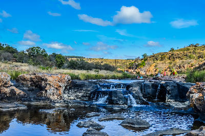 Rocky river pools and small waterfalls at Bourke's Luck Potholes in Mpumalanga, South Africa.