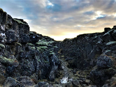 Rocky rift valley at Þingvellir National Park showing the exposed tectonic plate boundary in southwest Iceland.