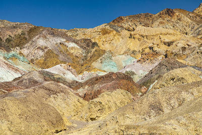 Colorful mineral hills at Artist’s Palette in Death Valley with yellow, green, and red tones