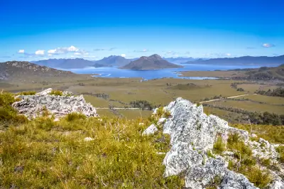 Panoramic view of Lake Pedder and Mount Solitary from Mount Eliza in Southwest National Park, southwest Tasmania, Australia.