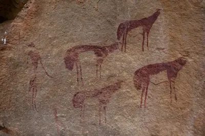 Ancient San rock art painted on a sandstone rock surface in the Mapungubwe Cultural Landscape.