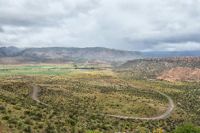 View across Biedouw Valley from Hoek se Berg Pass in the northern Cederberg, with Mertenhof and Welbedacht visible on the valley floor below.