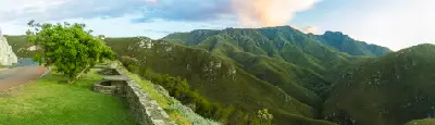 Panoramic view from an Outeniqua Pass lookout overlooking the folded green ridges of the Outeniqua Mountains above George in South Africa.