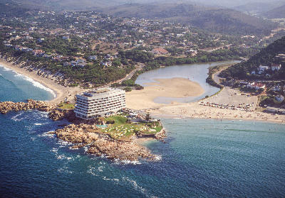 Aerial view of Beacon Isle in Plettenberg Bay showing the lagoon mouth, sandy beaches and rocky coastline along the Garden Route.