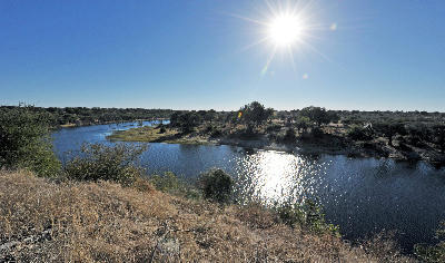 Sunlight reflecting on the Boteti Channel in Makgadikgadi Pans National Park, Botswana.