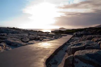 Accessible pathway through granite rocks at sunset near The Gap in Torndirrup National Park, Albany, Western Australia.