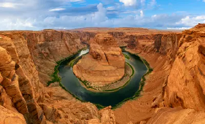 Horseshoe Bend Colorado River full meander view from rim Page Arizona sandstone canyon landscape