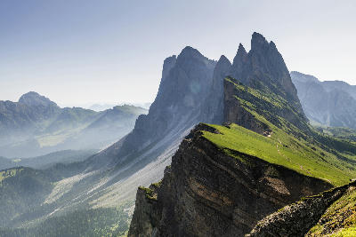 Towering cliffs along the Seceda ridge in the Dolomites, South Tyrol, Italy.