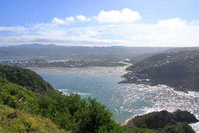 Elevated view from Featherbed Nature Reserve overlooking Knysna Heads, tidal sandbanks and the entrance to Knysna Lagoon on South Africa’s Garden Route.