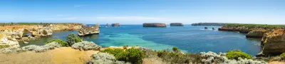 Panoramic view of limestone sea stacks scattered across Bay of Islands Coastal Park, Victoria.