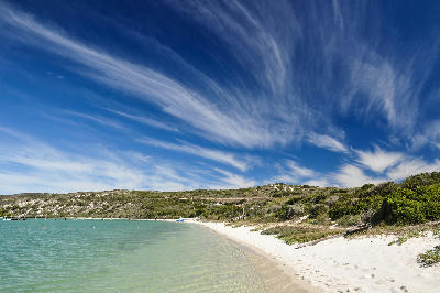 White sand shoreline and turquoise waters of Kraalbaai in West Coast National Park, South Africa.