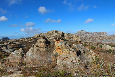 Layered sandstone formations and eroded rock plateaus in Isalo National Park, Madagascar