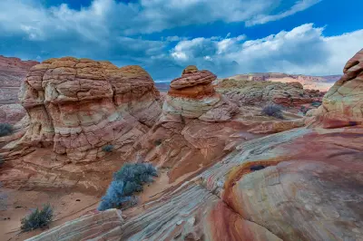 Rounded layered sandstone formations at White Pocket Paria Plateau Arizona