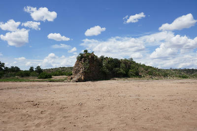 Sandstone outcrop on the dry Limpopo River floodplain in Botswana's Tuli Block, showcasing the rugged landscapes that define the Greater Mapungubwe region.