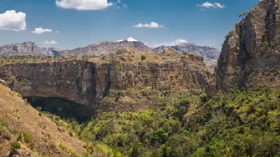 Deep sandstone canyon and oasis vegetation in Isalo National Park, Madagascar
