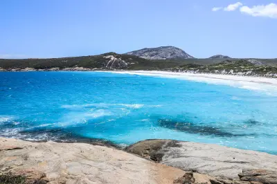 Turquoise water, white sand and granite peaks at Hellfire Bay in Cape Le Grand National Park, Western Australia.