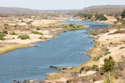The Sabie River winding through a broad valley in southern Kruger National Park, one of South Africa's most important wildlife and safari landscapes.