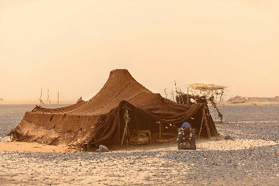 Nomadic desert camp during a sandstorm near Erg Chebbi in Morocco.