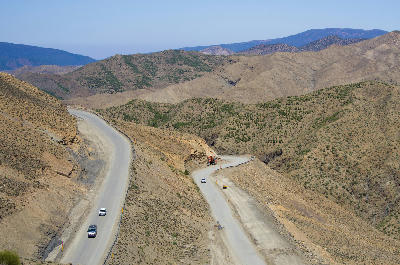 Mountain road crossing the Atlas Mountains near Tizi n'Tichka Pass in Morocco