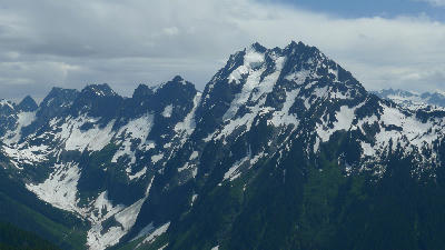Sharp snow-covered mountain peaks and ridgelines in North Cascades National Park, Washington