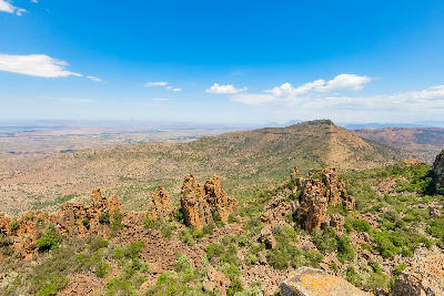 The Valley of Desolation viewpoint overlooking dolerite rock formations and the Karoo plains in Camdeboo National Park near Graaff-Reinet, South Africa.