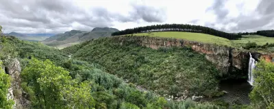 Wide view of Berlin Falls, its plunge pool and the surrounding forested gorge landscape on the Panorama Route in Mpumalanga, South Africa.