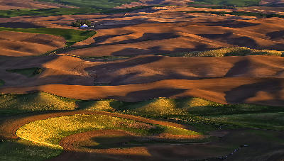 Steptoe Butte sunrise rolling farmland Palouse Washington