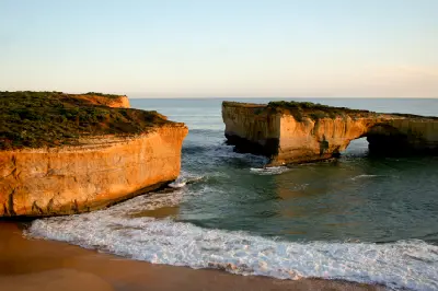 London Arch and surrounding limestone cliffs in Port Campbell National Park, Victoria.