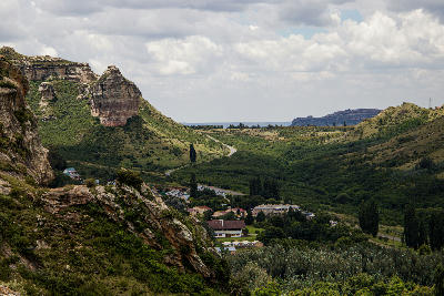Sandstone cliffs and a green valley overlooking Clarens in the eastern Free State, South Africa.
