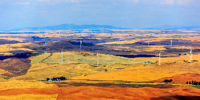 Wind turbines across rolling Palouse farmland viewed from Steptoe Butte in Washington State