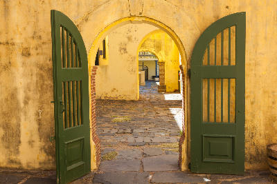 Arched doorway and corridor inside the Castle of Good Hope historic fort in Cape Town, South Africa.