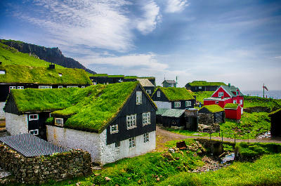 Mykines Island village with traditional grass-roofed houses