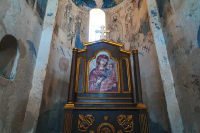 Religious icon beneath historic Armenian frescoes inside the 10th-century Holy Cross Church on Akdamar Island, eastern Turkey.