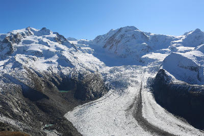 Gorner Glacier flowing beneath the Monte Rosa massif viewed from Gornergrat near Zermatt, Switzerland.