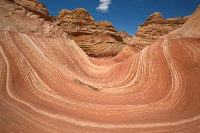 Curved layered sandstone basin at The Wave in Coyote Buttes North Arizona