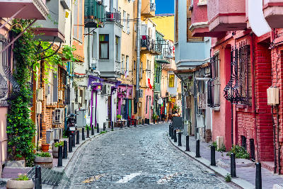 Beautiful colorful houses on a cozy narrow street in Balat district in Istanbul, Turkey.