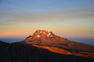 Mawenzi Peak (5,149 m) glowing in the evening light above the Saddle on Mount Kilimanjaro, Tanzania, viewed from approximately 4,700 metres above sea level.