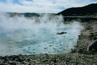 Excelsior Geyser Crater Yellowstone steaming hot spring Midway Geyser Basin boardwalk Wyoming