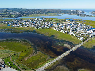 Marina, canals, boats, and waterfront architecture at Thesen Island Waterfront in Knysna Lagoon on the Garden Route.