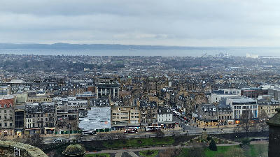 City view over Edinburgh from Arthur’s Seat with the Firth of Forth visible in the distance.