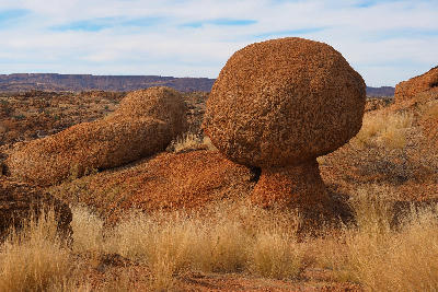 Balancing granite boulder perched on weathered rock at Moon Rock in Augrabies Falls National Park, Northern Cape, South Africa.
