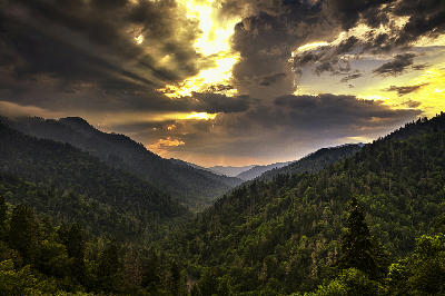 Dramatic storm clouds clearing above the forested valleys of Morton Overlook in Great Smoky Mountains National Park.