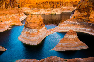 Reflection Canyon close up sandstone towers Lake Powell mineral bands low water Glen Canyon Arizona Utah