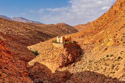 Kasbah overlooking the rocky canyon landscape of Dades Valley along the Dades Gorge Road in Morocco