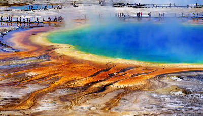 Grand Prismatic Spring Yellowstone National Park colorful geothermal hot spring with boardwalk and tourists