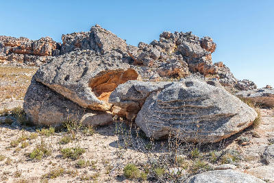 Ancient sandstone formations along the trail connecting Wolfberg Cracks and Wolfberg Arch reveal the rugged wilderness landscapes of the Cederberg Mountains near Sanddrif in the Western Cape, South Africa.